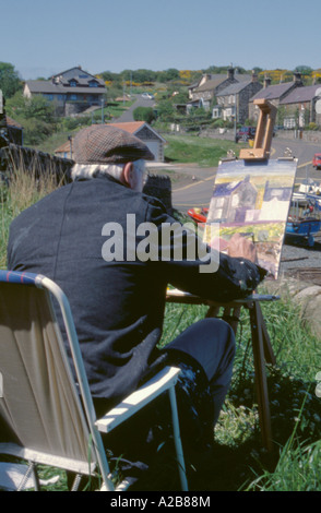 Künstler bei der Arbeit; Craster, Northumberland, England, UK. Stockfoto