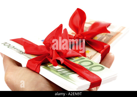 Trauben von Banknoten als Geschenk gebunden Stockfoto