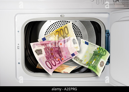 Euro-Banknoten in Waschmaschine, close-up Stockfoto