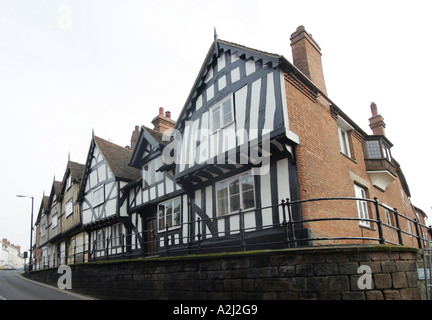 Fachwerkhäusern an der Ecke von Leycester Ort und High Street, Warwick, Stockfoto