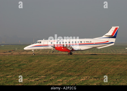 Eastern Airways BAe Jetstream Flugzeuge Rollen am Flughafen Birmingham, West Midlands, England, UK Stockfoto