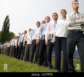 Geschäftsleute in einer Warteschlange Stockfoto