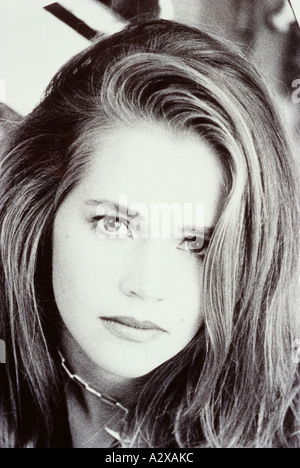 Gesicht der schönen jungen Frau mit langen Haaren. Stockfoto