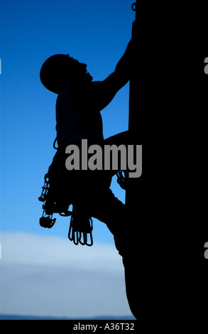 Silhouette-Kletterer Stockfoto