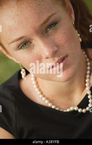 Ziemlich junges Mädchen mit roten Haaren Stockfoto