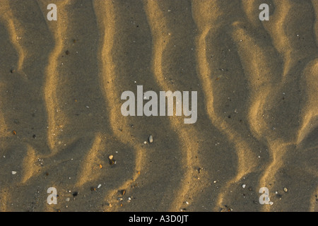 Konzept / abstrakt - Wasser Muster im Sand. Stockfoto