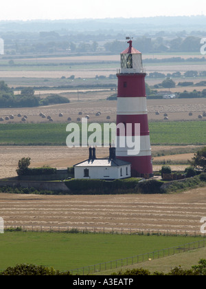 Ansicht von happisburgh Lighthouse vom Turm von St. Mary's-Kirche, happisburgh, Norfolk, East Anglia, England, Großbritannien Stockfoto