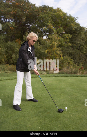 Frau, Golfen Stockfoto