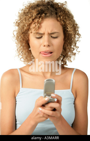 Junge Frau messaging Stockfoto