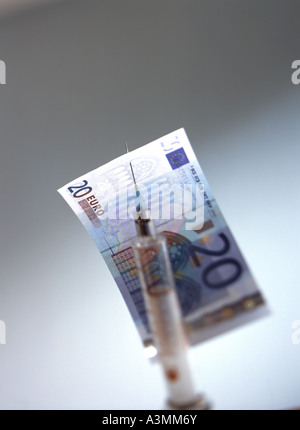 20 EURO-BANKNOTE VON HYPODERMATISCHE NADEL NADEL STACH Stockfoto