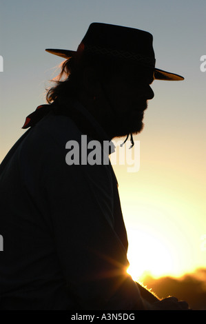 Silhouette Gaucho bei Sonnenuntergang, Fiesta De La Tradicion, San Antonio de Areco, Provincia de Buenos Aires, Argentinien Stockfoto