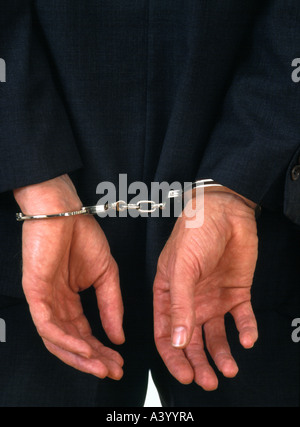 Mann in Handschellen Stockfoto