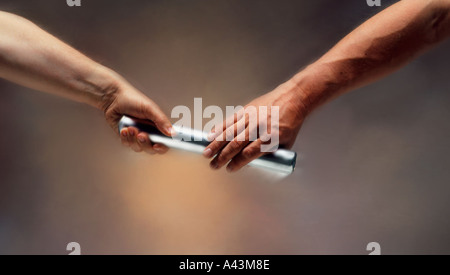 Staffelläufer übergeben-baton Stockfoto