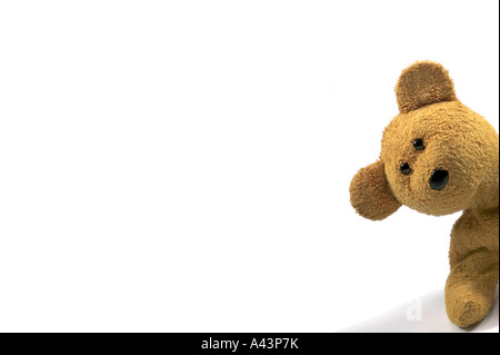 Suche in der rechten Seite des weißen Rahmenhintergrund für Text Teddybär Stockfoto