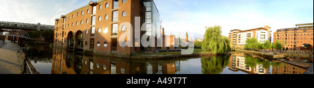 Panoramablick über Kaufleute Lager auf der Bridgewater Canal, Castlefield Bassin, Manchester, UK Stockfoto