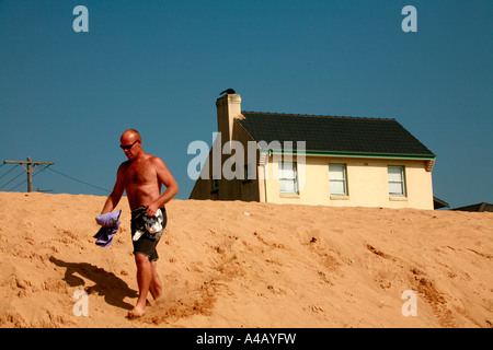 Haus bedroht durch die erwarteten Auswirkungen der globalen Erwärmung und Klimawandel in Narrabeen Strand Sydney Australia Stockfoto