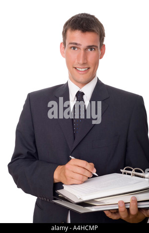Junger Geschäftsmann schreiben und lächelnd Stockfoto