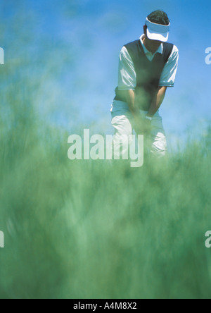 Golfspieler, vorbereiten, schwingen Stockfoto