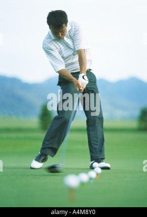 Golfer üben auf der driving-range Stockfoto