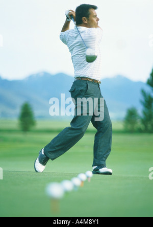 Golfer üben auf der driving-range Stockfoto