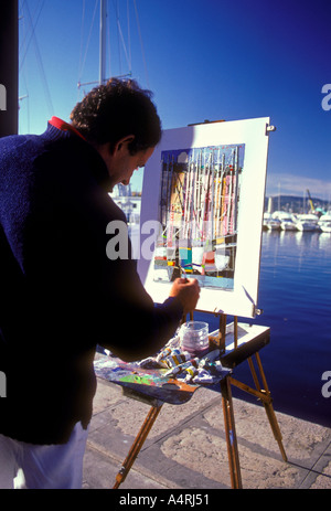 1, 1, Franzose, französischer Mann, Künstler, Maler, Malerei, Marina, Stadt von Saint Tropez, Saint Tropez, Côte d'Azur, Cote d'Azur, Frankreich Stockfoto