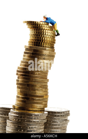 Figur Klettern Stapel der Münzen Stockfoto