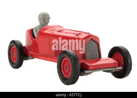 Roter Spielzeug Rennwagen alt altmodisch 1930 Geschwindigkeit gefahren Auto Profil Fahrzeugseite auf Sport Rennen junge Mann Männer Oldtimer Automobil Stockfoto