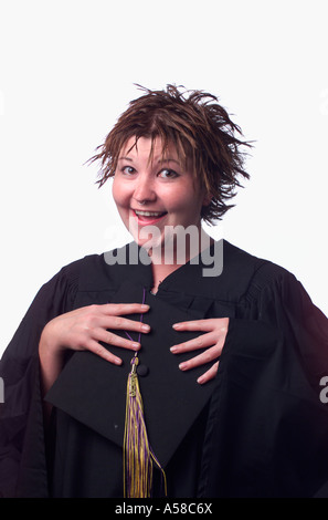 Porträt der Hochschulabsolvent in Mütze und Mantel Stockfoto