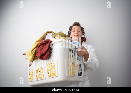 Frau mit Wäsche Stockfoto