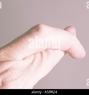 Gekreuzte Finger Stockfoto
