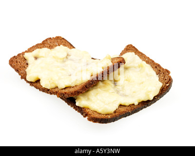 Roggen Toast mit zerdrückte Banane Stockfoto