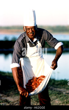 Koch in Louisiana bereitet sich auf Langusten Kochen Stockfoto