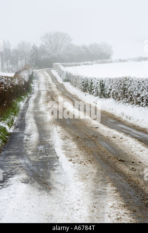Verschneite Fahrspur Stockfoto
