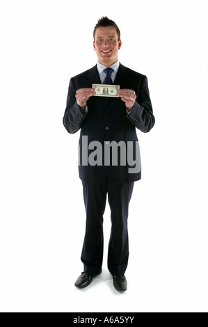 Geschäftsmann hält einen Dollarschein Stockfoto
