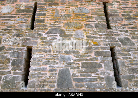 Eine traditionelle alte mittelalterliche Steinmauer mit vier Pfeil-Fenster Nachschlagen Stockfoto