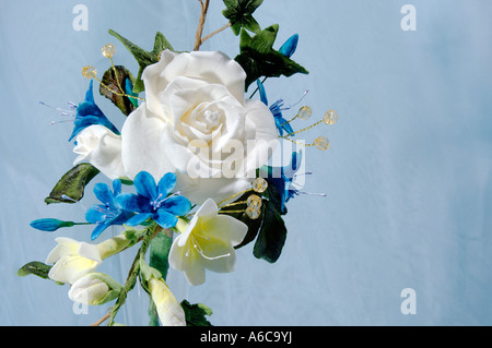 Zucker, Puderzucker Blumendekoration Blumenstrauß ausführliche oben auf einer Hochzeitstorte schließen sich Makro Studiendesign von Pam Hannon Stockfoto