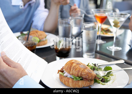 Geschäftsleute mit Mittagessen Stockfoto