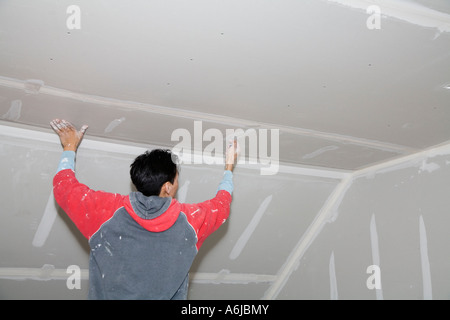 Gastarbeiter Anwendung Trockenbau Joint Verbindung Gebäude 1 Stockfoto