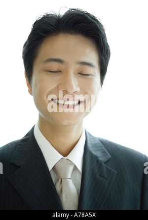 Geschäftsmann, Augen geschlossen, Porträt Stockfoto