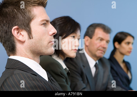 Geschäftsleute in Folge Stockfoto