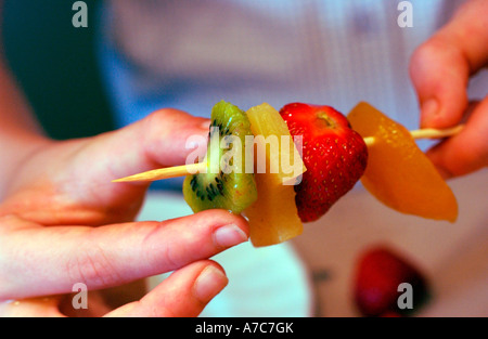 chef making fresh fruit kebab Stockfoto
