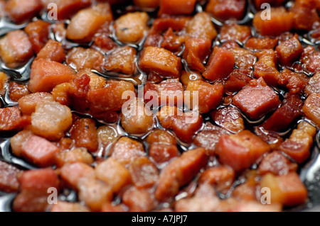 Speck braten in einer Pfanne Stockfoto