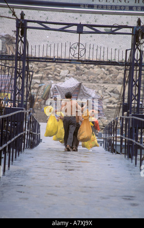 Asien, China, Fuling. Strichmännchen, ungelernte Arbeiter neue Städte von Bauernhöfen Stockfoto