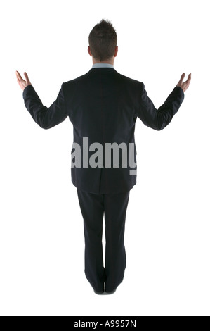 Rückansicht eines Mannes in einem Anzug während einer Rede, die isoliert auf weiss Stockfoto