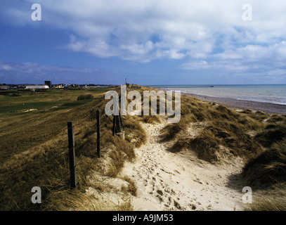 Weststrand erstreckt sich in Richtung Climping Sand der Dünen befinden sich in der Gefahr der Erosion West Sussex England Stockfoto