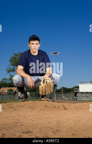 Teenager-Jungen Baseball spielen Stockfoto