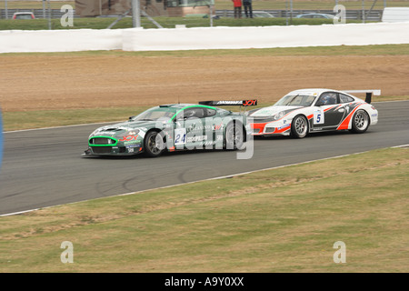 Aston Martin DBRS9 + Porsche 997 GT3 Stockfoto