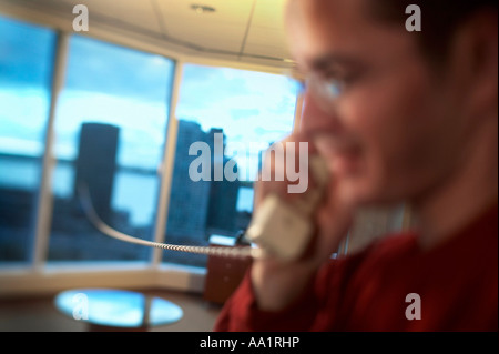 Geschäftsmann mit Telefon Stockfoto