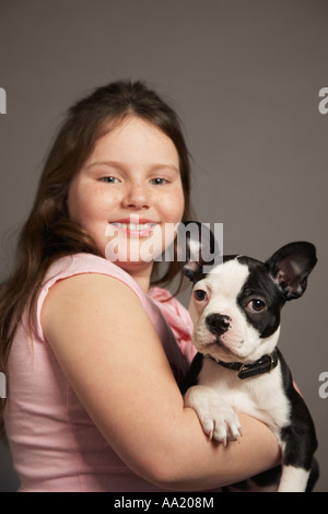 Porträt eines Mädchens mit Hund Stockfoto