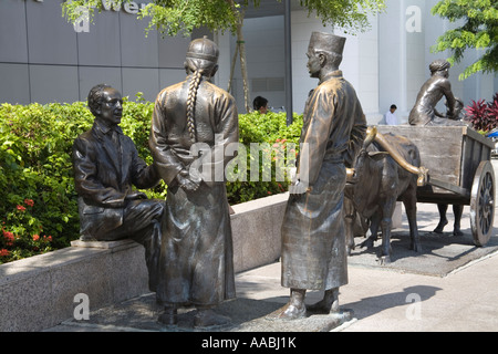 Singapur Asien kann der Fluss Kaufleute Skulptur von Aw t Hong am Boat Quay Stockfoto